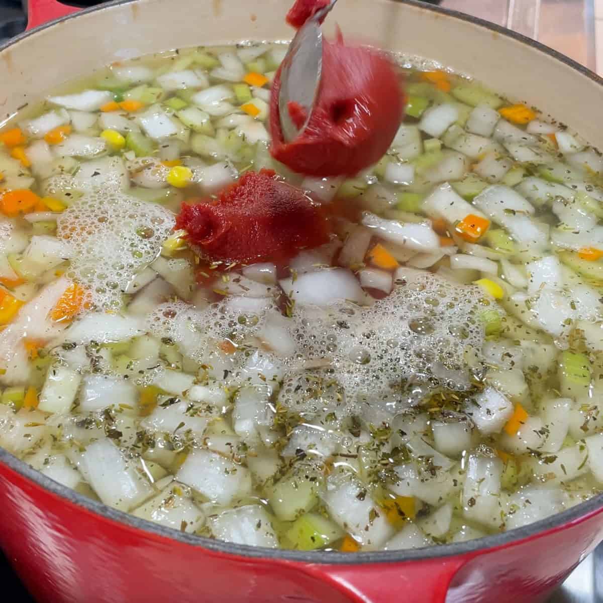 Process Step 2 - add green beans, corn, tomatoes, tomato paste