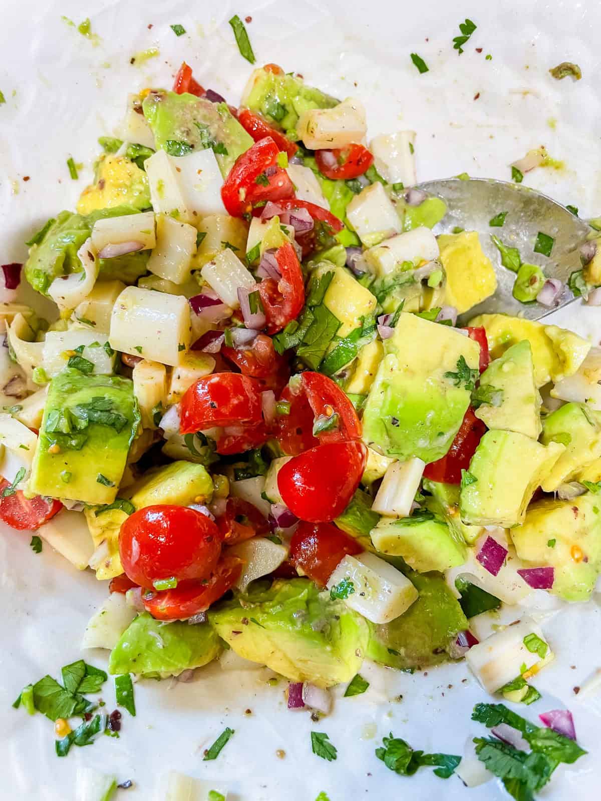 Process Step 4 - Gently fold in chopped avocado into veggie ceviche