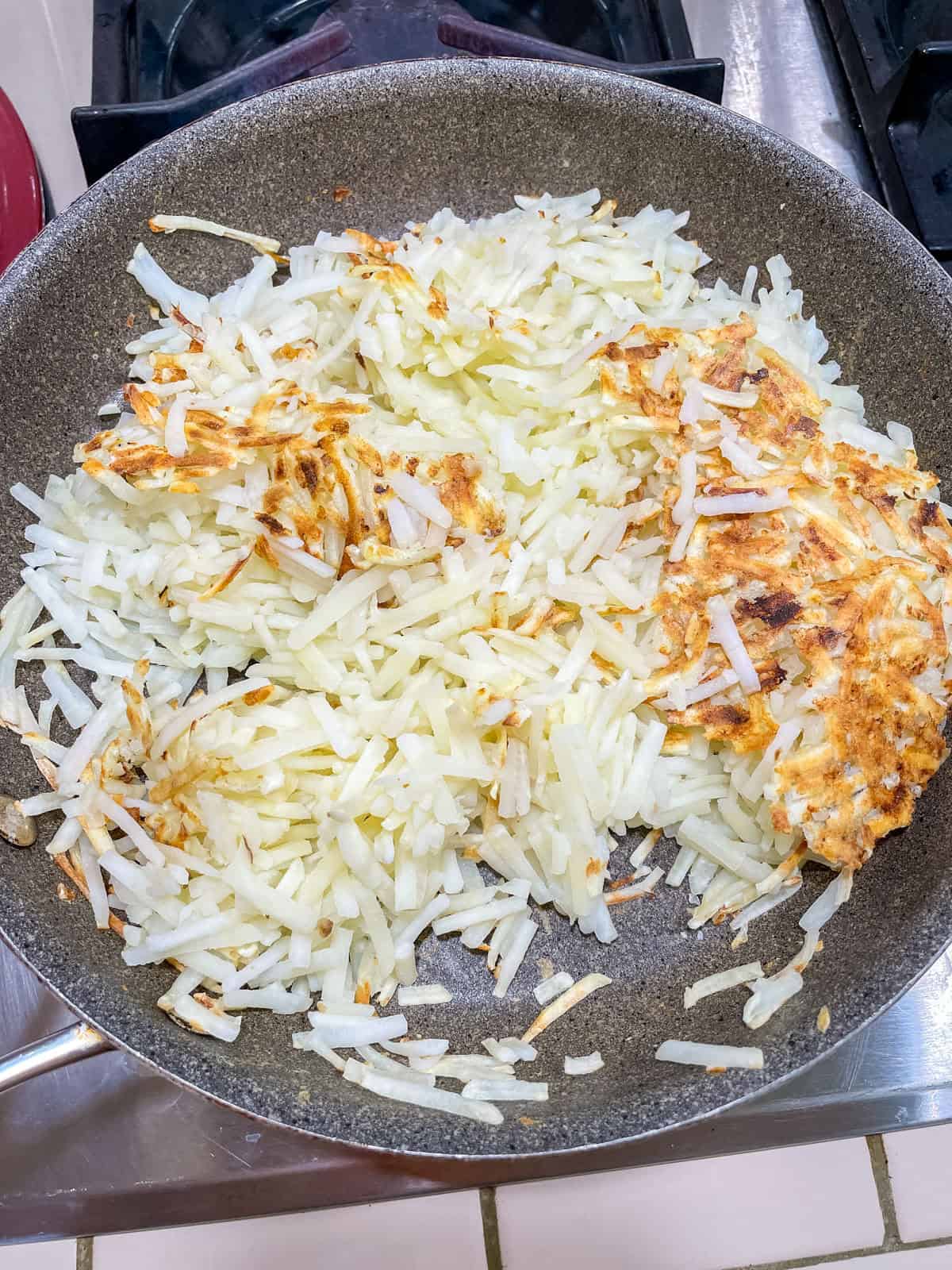 Process step 1 cook hash browns in non-stick skillet