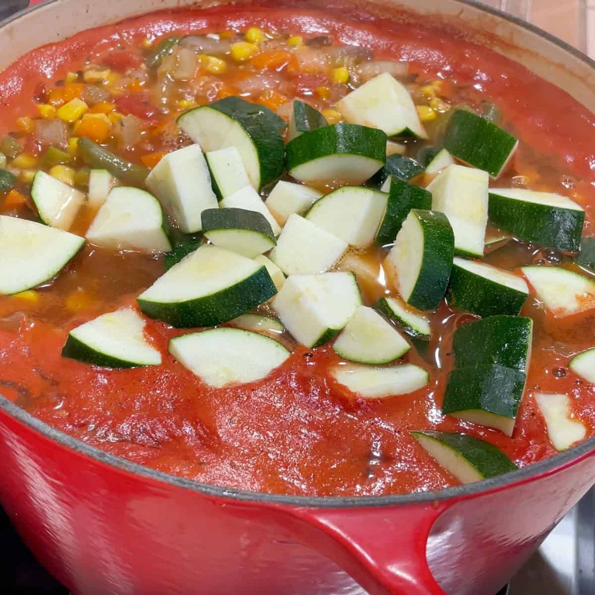 Process step 3 - add zucchini, salt and pepper and simmer until tender