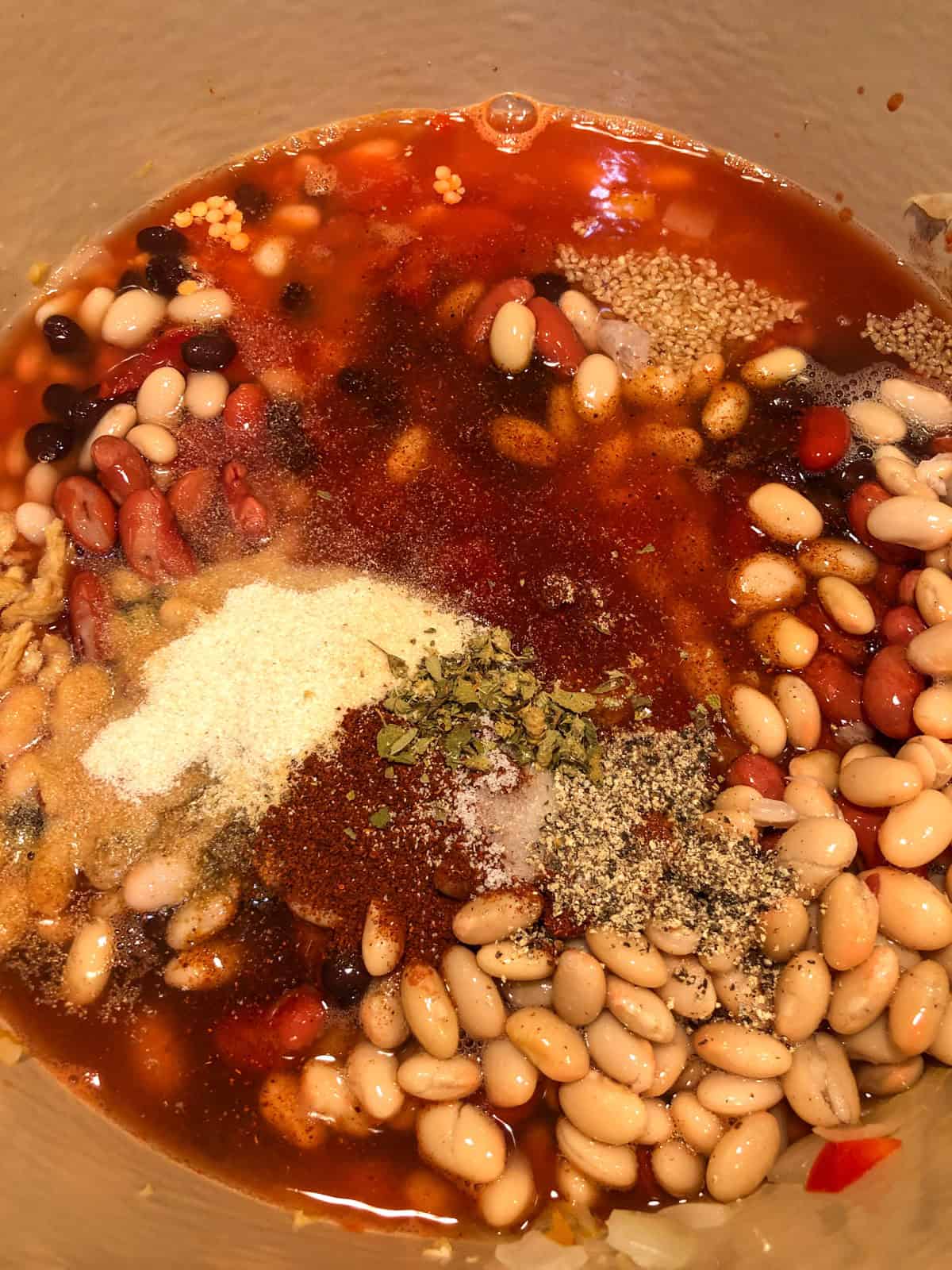 Process step 4 add tomatoes and spices