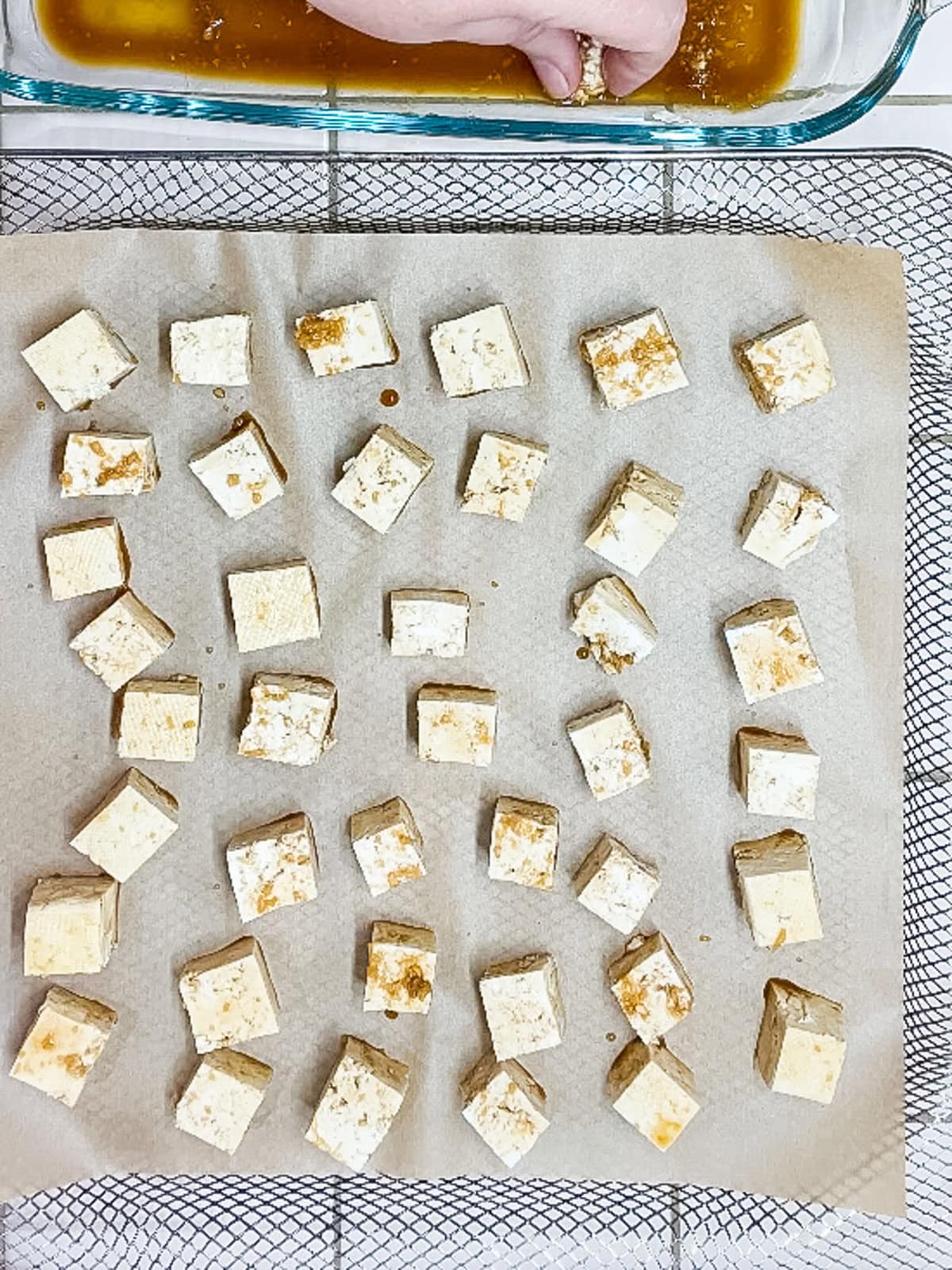 Process step 5 - transfer tofu to parchment lined air fryer basket