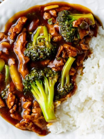 white bowl with steamed jasmine rice and soy curl beef and broccoli