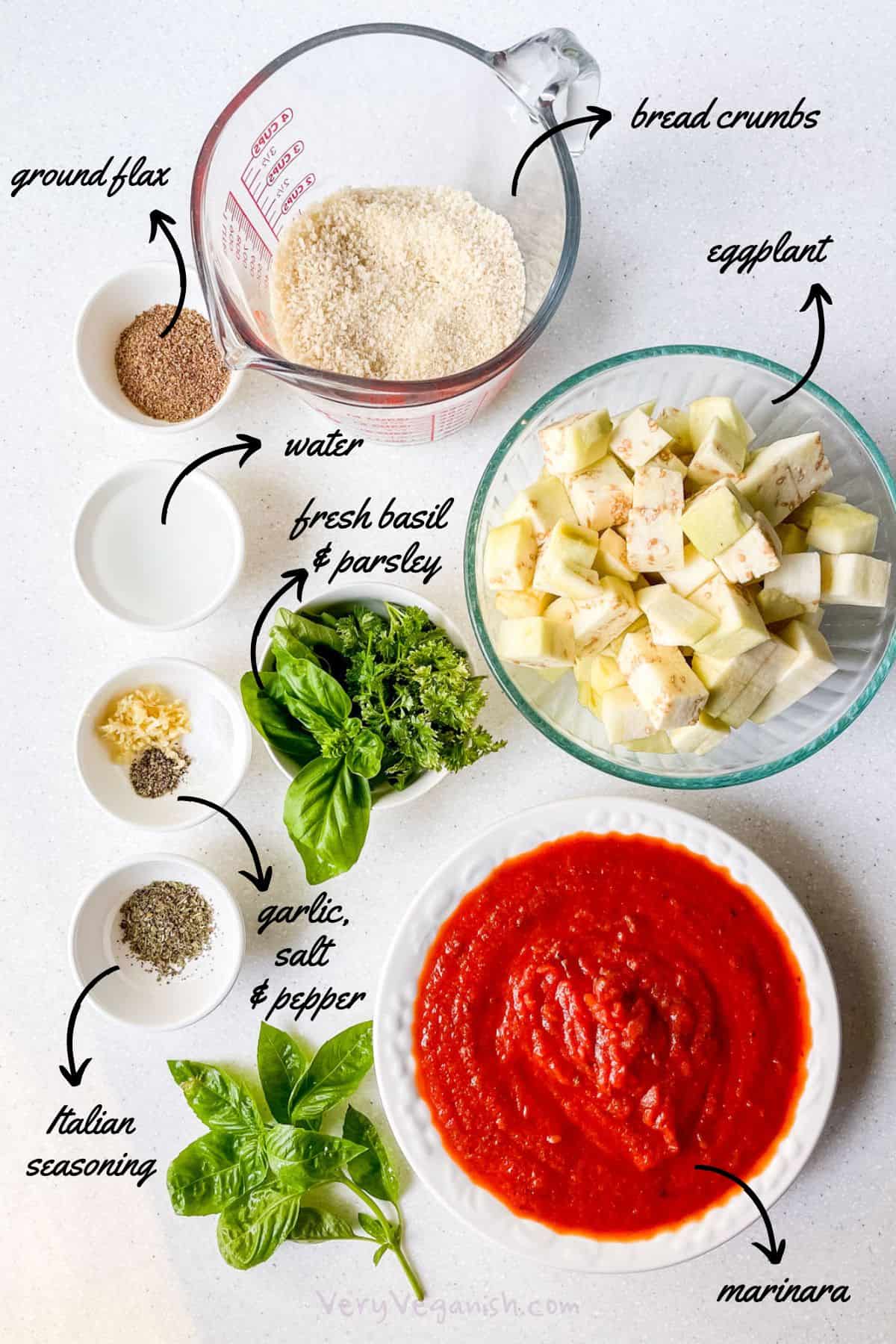 Ingredients for eggplant meatballs with no egg: chopped eggplant, bread crumbs, ground flaxseed, water, fresh basil, fresh parsley, italian seasoning (dried), crushed garlic, salt, pepper and marinara sauce