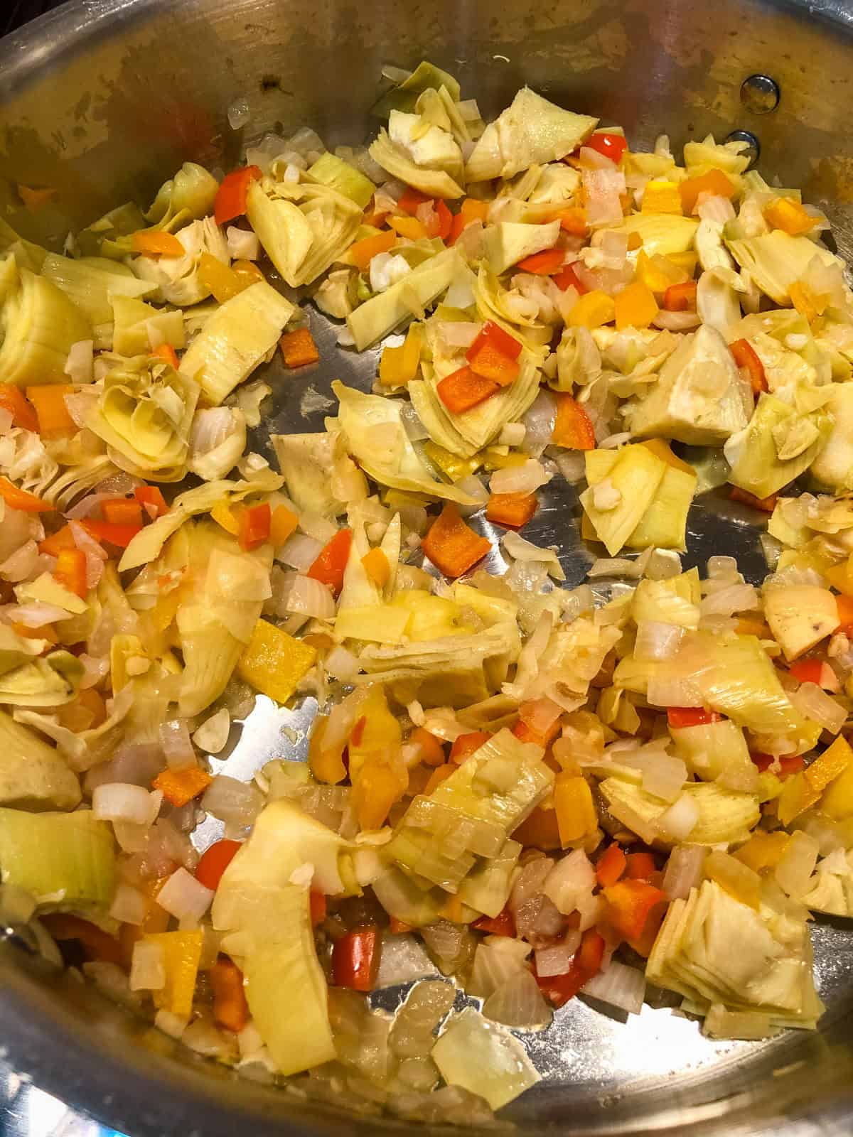 Process step 3 - add artichoke to pan and heat up