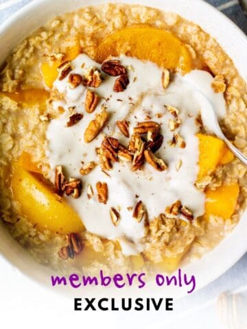 white bowl full of non-dairy peaches and cream oatmeal with pecans and vanilla yogurt on top - label reads "members only exclusive"