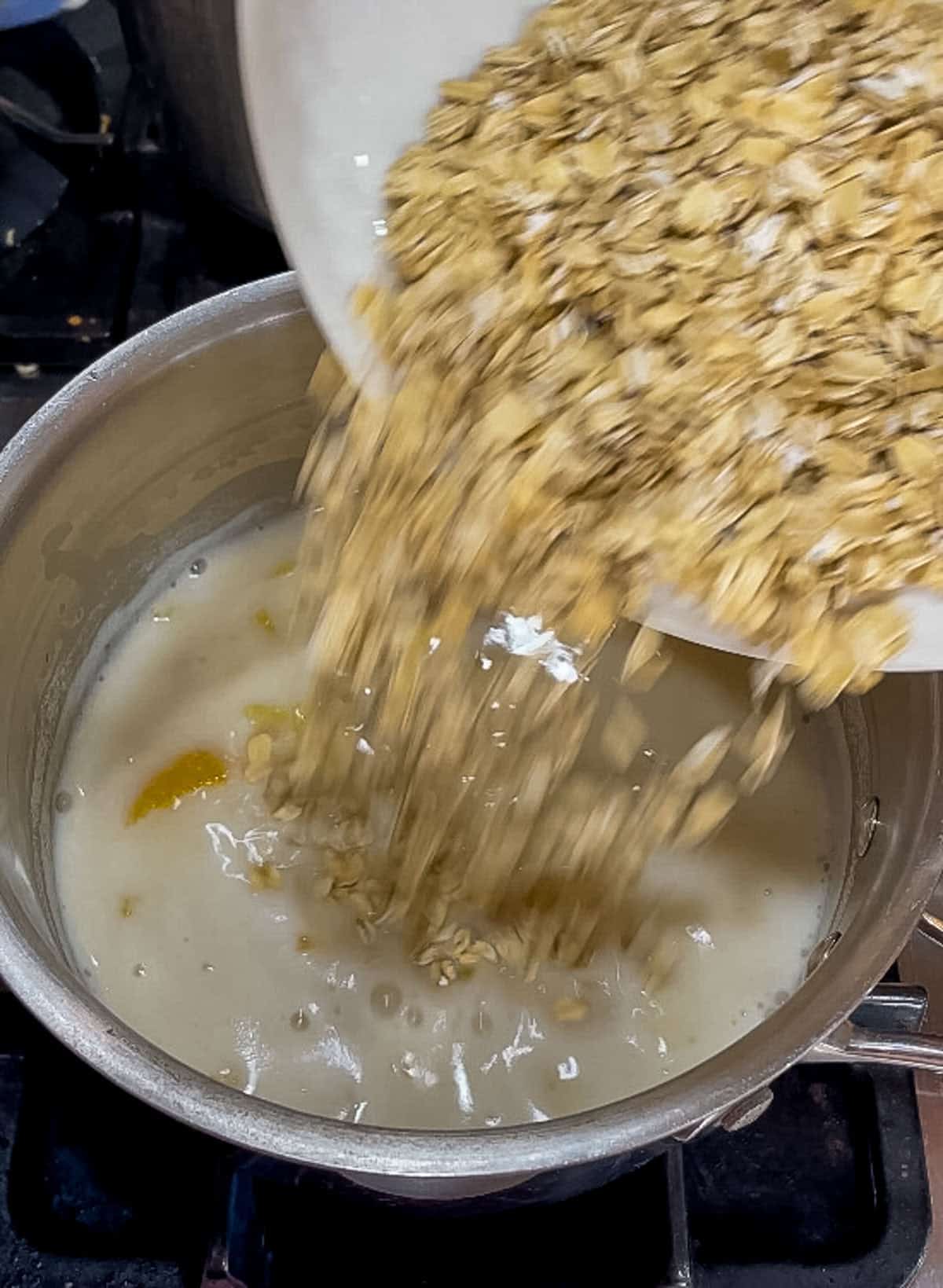 pouring oats into pan