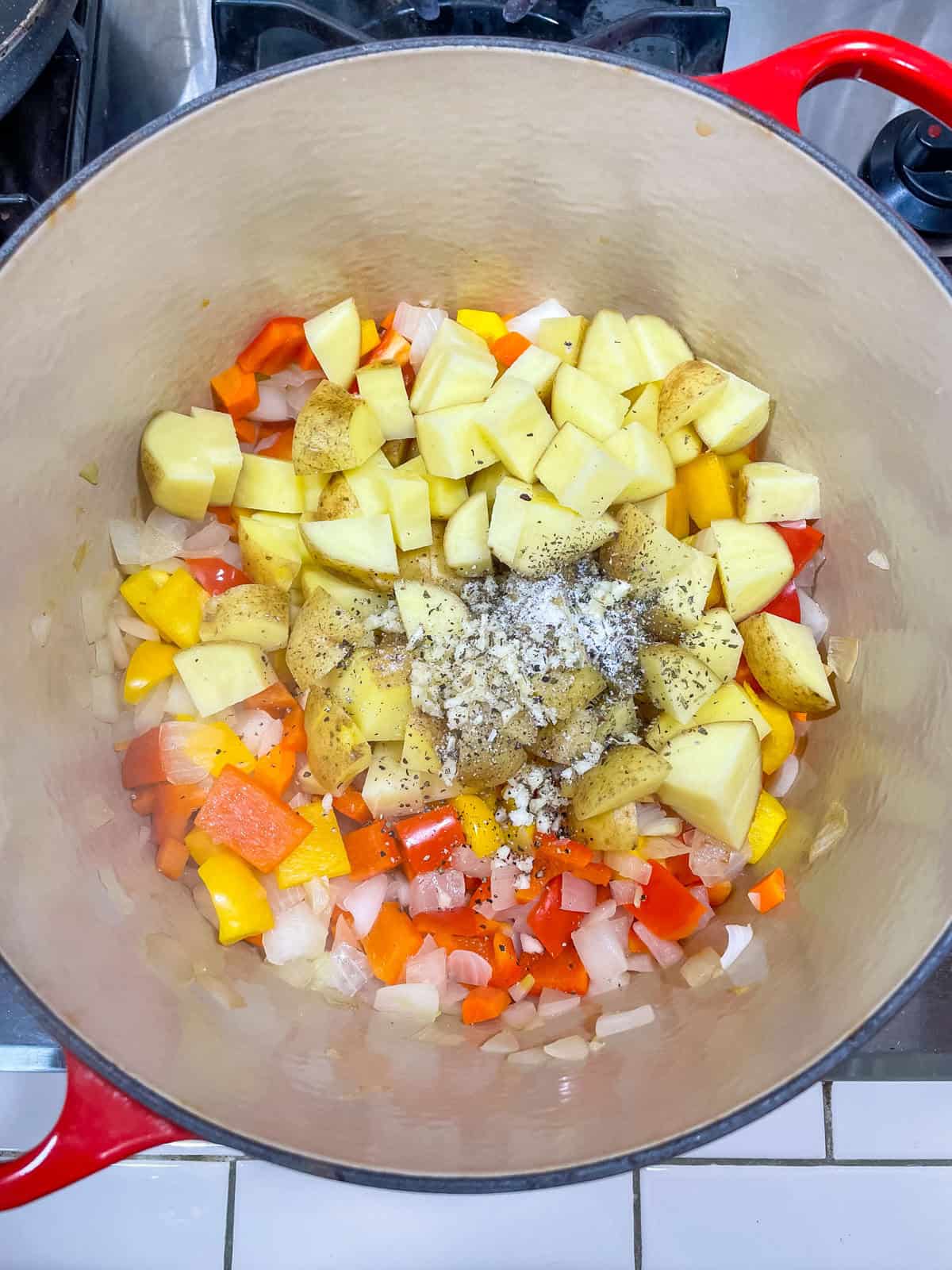 potatoes and seasonings added to pot