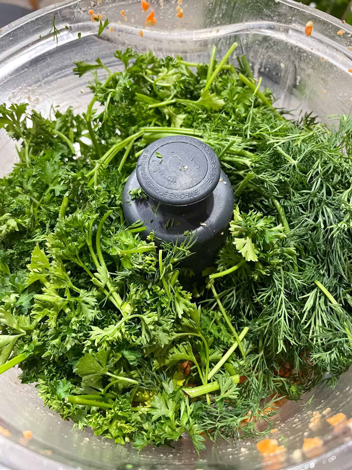 food processor with dill and parsley added