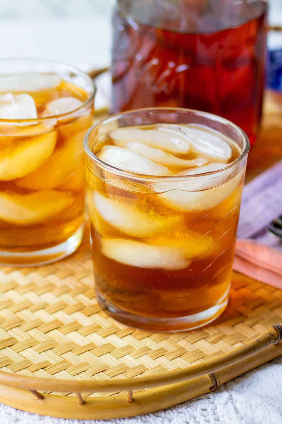 Close-up of refreshing rooibos iced tea with ice cubes made from loose leaf rooibos tea.